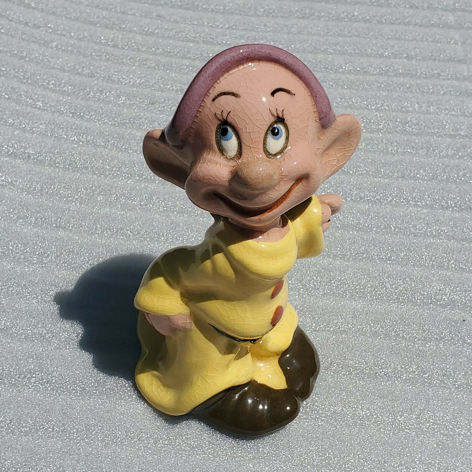 Snow Whites "dopey"  By American Pottery Co. Walt Disney Figurine 5 3/4". Clean